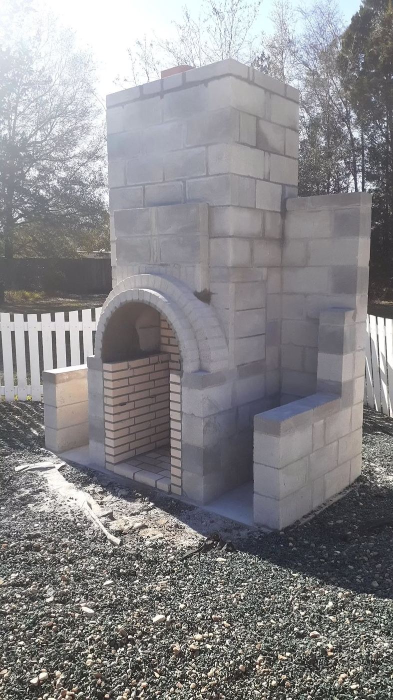 Outdoor fireplace in progress by Island Times Masonry